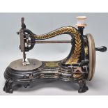 A vintage early 20th Century cast iron sewing machine by Jones 'The Lightning Hand Machine' having