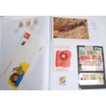 A collection of 3 stamp and postcard albums to include China with stamps, covers, postcards and