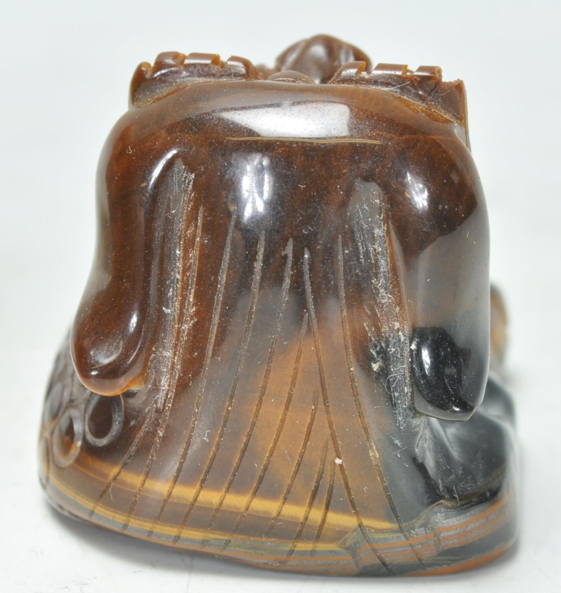 A good early 20th Century Chinese tigers eyes carved figure of a fu dog. Measures 5 cm tall by 5 - Bild 3 aus 7
