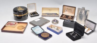 A collection of vintage gentleman's items to include a boxed blue celluloid Burnham London