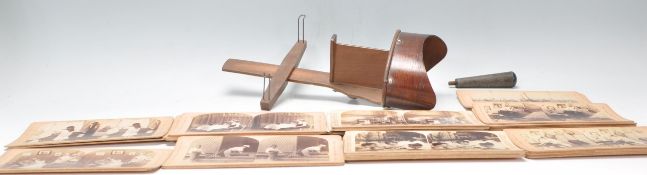 An early 20th Century wooden stereoscopic slide viewer along with a small quantity of stereoscope