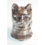 A silver hallmarked vesta case in the form of a cats head with a bow tied around it's neck.