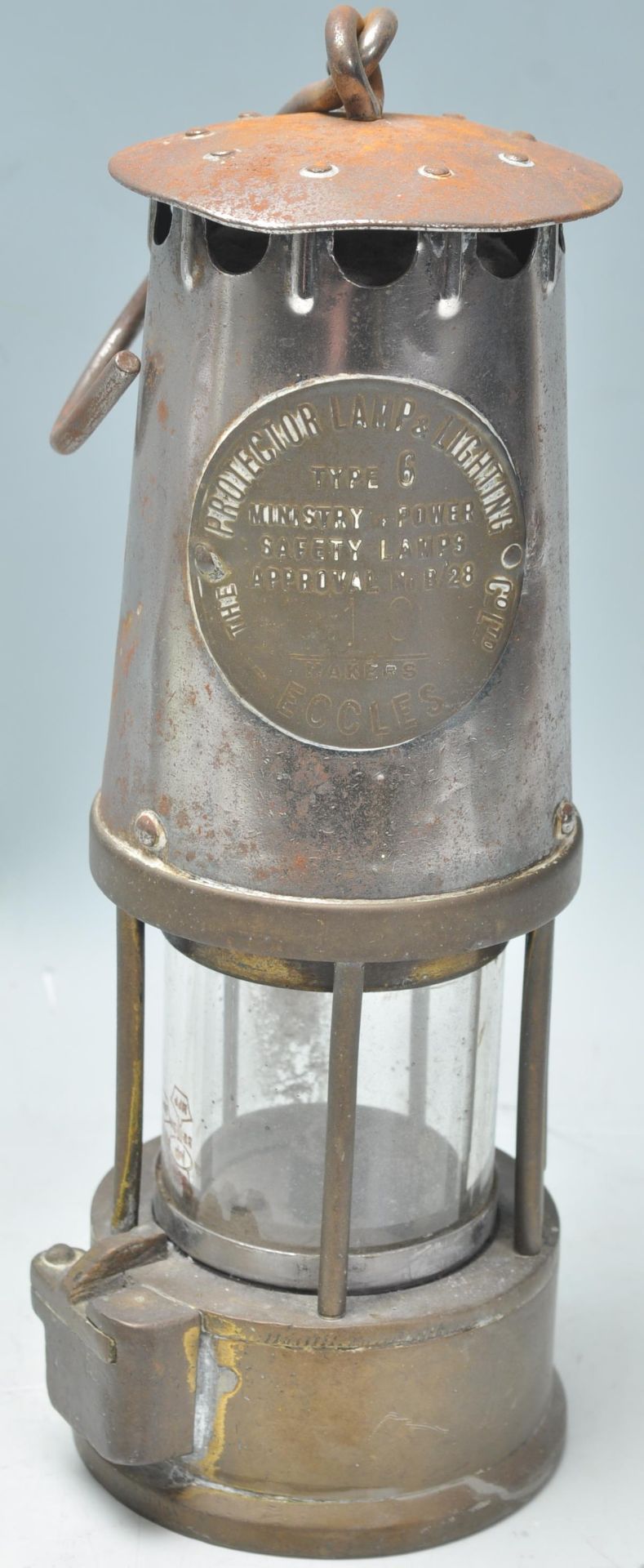 A mid 20th century brass Eccles 'Protector Lamp & Lighting miners lamp embossed 'Protector Lamp &