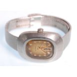 A retro mid century ladies Seiko Hi-Beat 21 Jewels wristwatch. Stainless steel case with gold dial