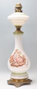 A 19th Century Victorian milk glass and brass oil lamp having a transfer printed classical