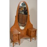 A good 19th century continental burr walnut drop centre dressing table having stunning large oval