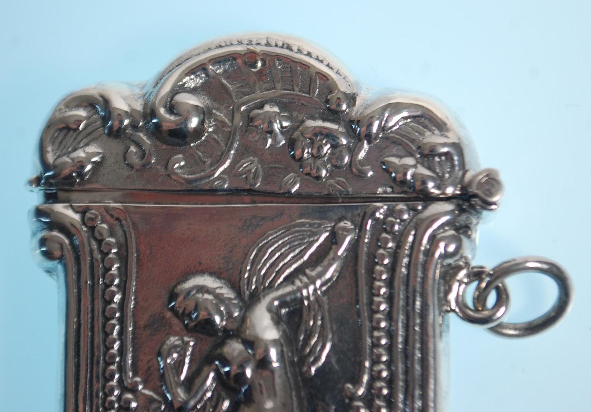 A stamped 925 silver vesta case having a repousse decoration fairy with scrolled borders. Measures - Image 6 of 7