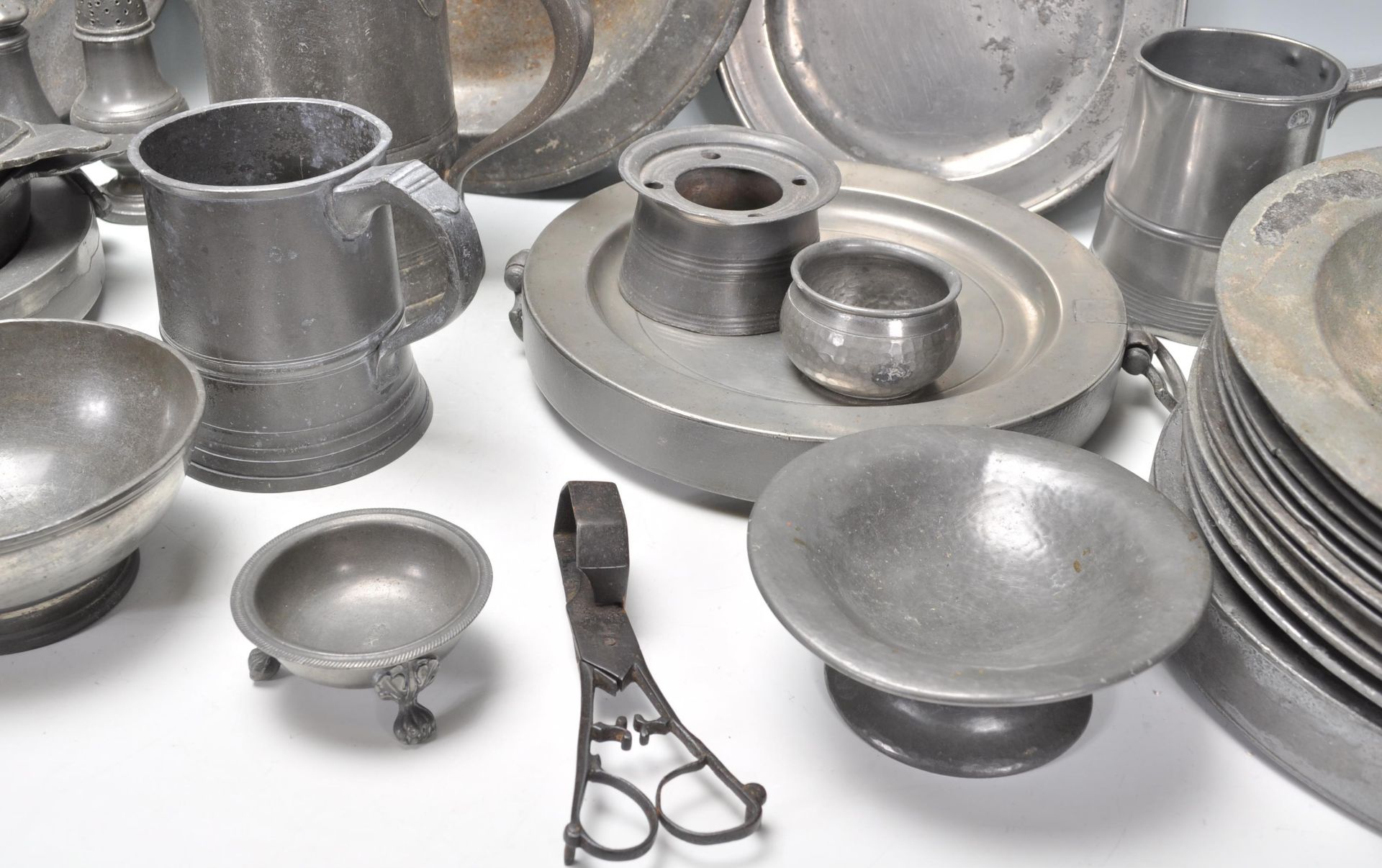 A collection of 18th Century antique pewter wares to include a large selection of plates and - Image 4 of 11