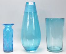A group of three vintage retro blue glass vases to include a large example having a etched ribbed