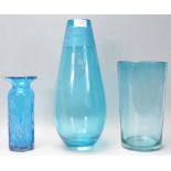 A group of three vintage retro blue glass vases to include a large example having a etched ribbed