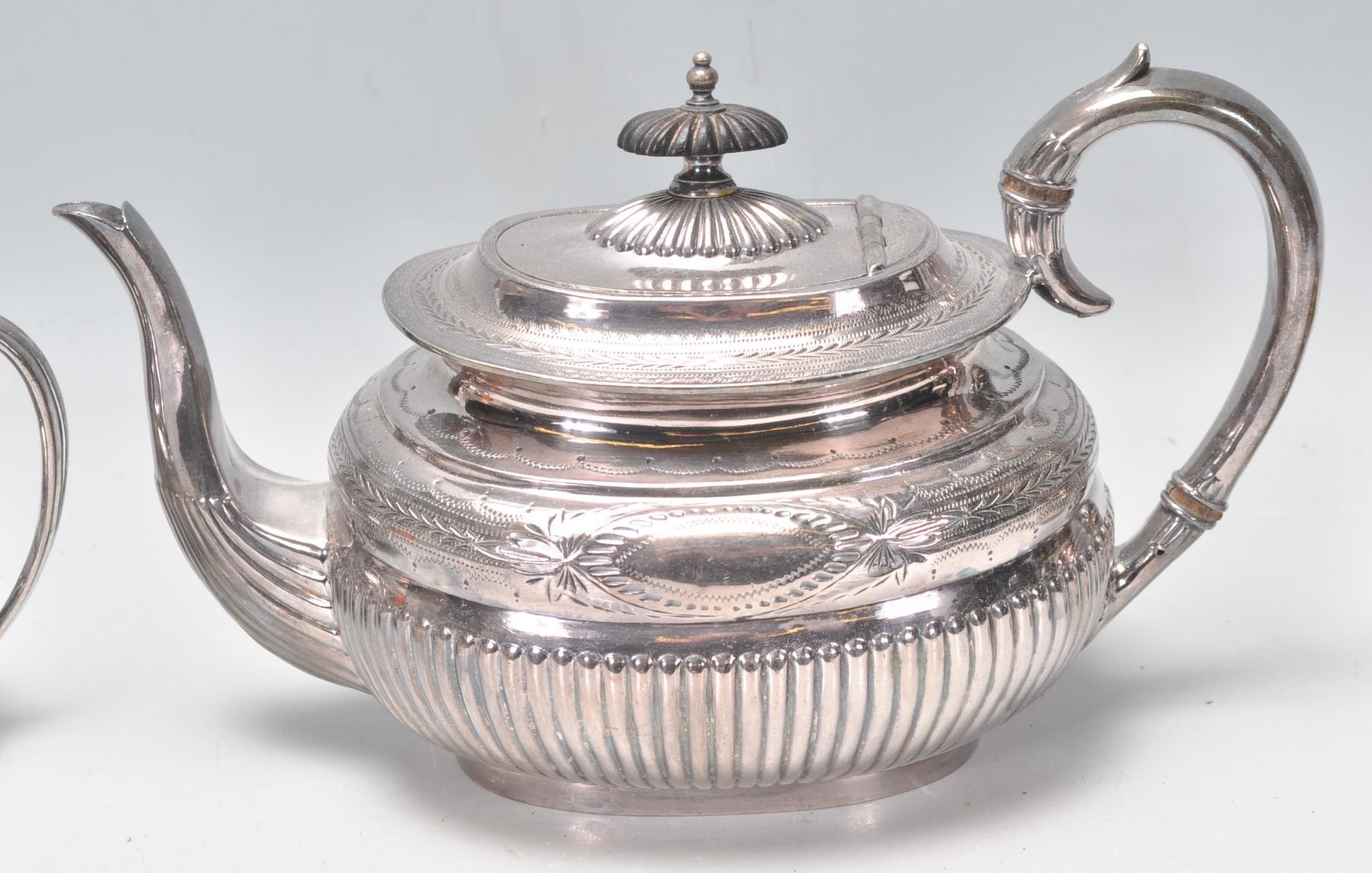 A late 19th century / early 20th century silver plate 3 tea service comprising teapot, sugar bowl - Image 4 of 11