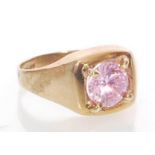 A hallmarked 9ct gold and pink stone ring. Hallmar