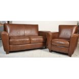 Natuzzi Italia - A contemporary brown leather two seater sofa settee and matching armchair. Both