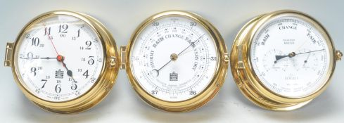 A contemporary bulkhead brass cased Precision Aneroid Barometer by Sewills of Liverpool together