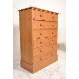 A good quality Antique style large country pine 2 over 4 chest of drawers. Raised on a plinth base