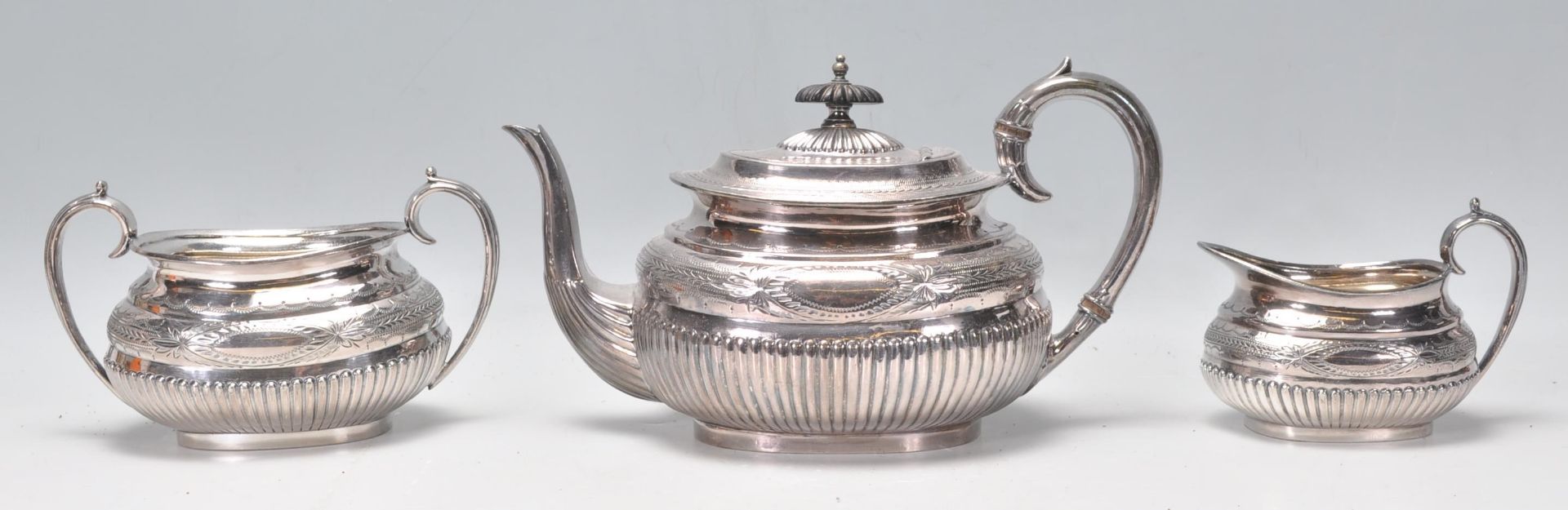 A late 19th century / early 20th century silver plate 3 tea service comprising teapot, sugar bowl