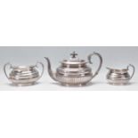 A late 19th century / early 20th century silver plate 3 tea service comprising teapot, sugar bowl