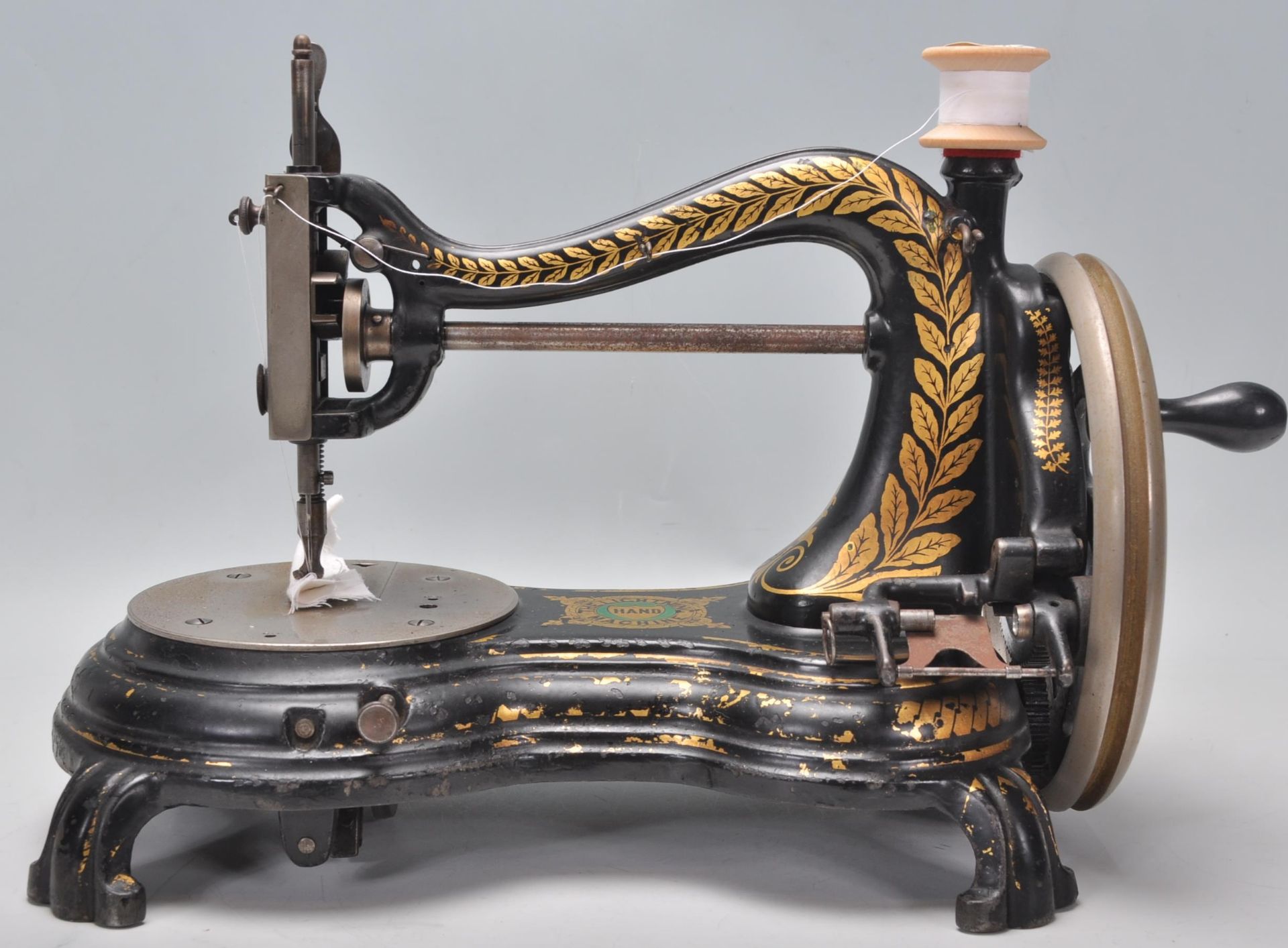 A vintage early 20th Century cast iron sewing machine by Jones 'The Lightning Hand Machine' having - Bild 2 aus 7