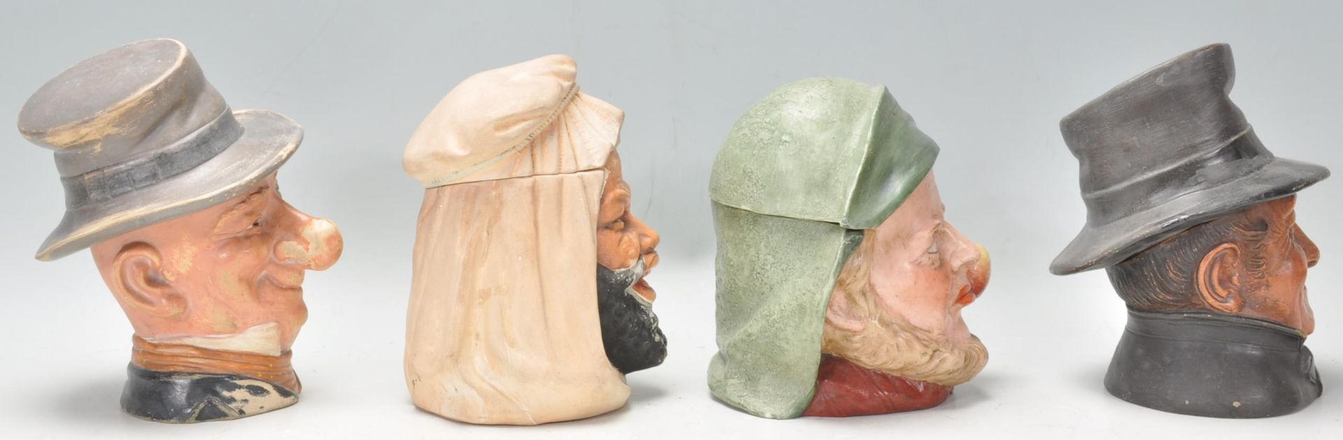 A group of four early 20th Century novelty figural character tobacco jars to include an Arabian - Bild 2 aus 5