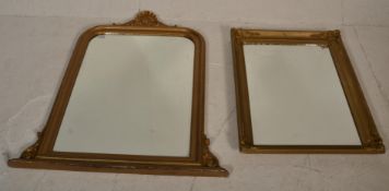 An early 20th Century gilt framed overmantel mirror having shell decoration atop. Together with