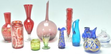 A collection of 20th Century bohemian glass to include a faceted ruby glass being acid etched with