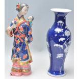 A 19th Century Chinese blue and white baluster vase having painted in the prunus pattern, together