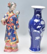 A 19th Century Chinese blue and white baluster vase having painted in the prunus pattern, together