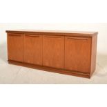 A retro mid 20th Century G Plan low teak wood sideboard credenza having a configuration of two