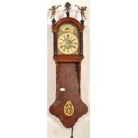 A late 18th / early 19th century Dutch frieze ' Friesland Staart ' wall clock, the arched cornice