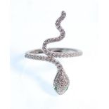 A stamped 925 silver snake ring set with white and green accent stones. Weight 3.2g. Size N.5.