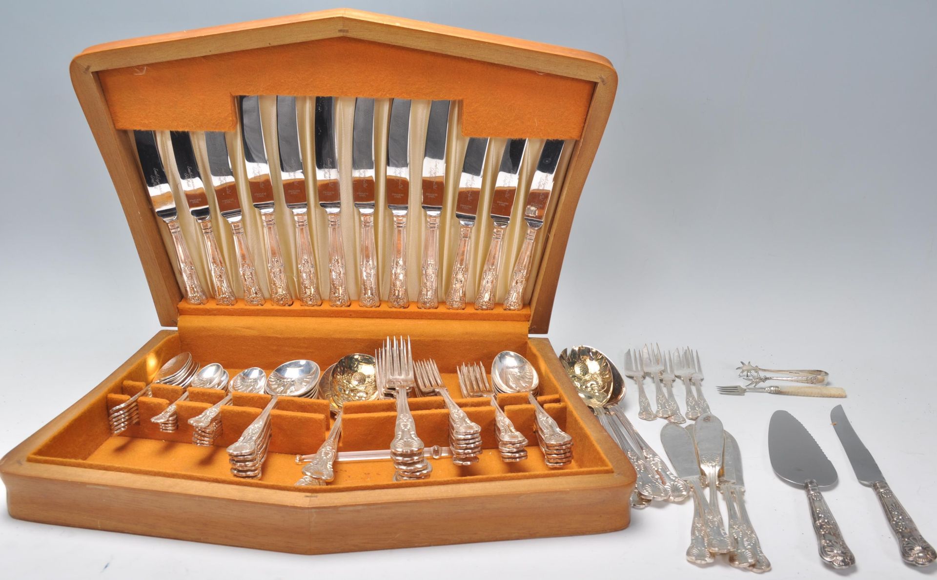 A 20th Century Smith Seymour cutlery canteen, each piece having raised floral decoration and set