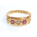 A 19th Century Victorian hallmarked 18ct gold ring gypsy set with a diamond and flanked by two