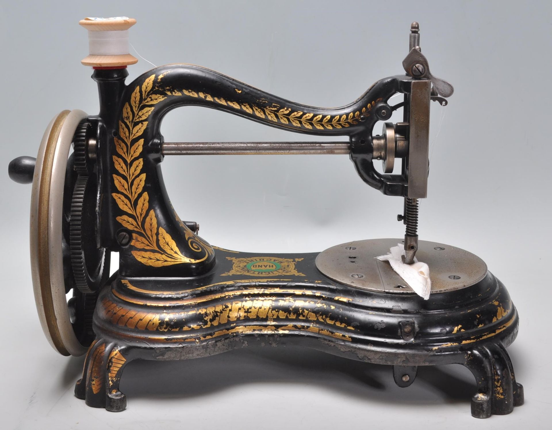 A vintage early 20th Century cast iron sewing machine by Jones 'The Lightning Hand Machine' having - Bild 4 aus 7