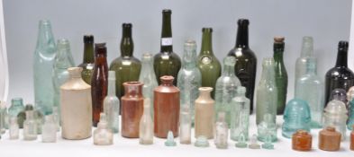 A collection of 19th Century Victorian advertising beer and apothecary bottles, to include glass and