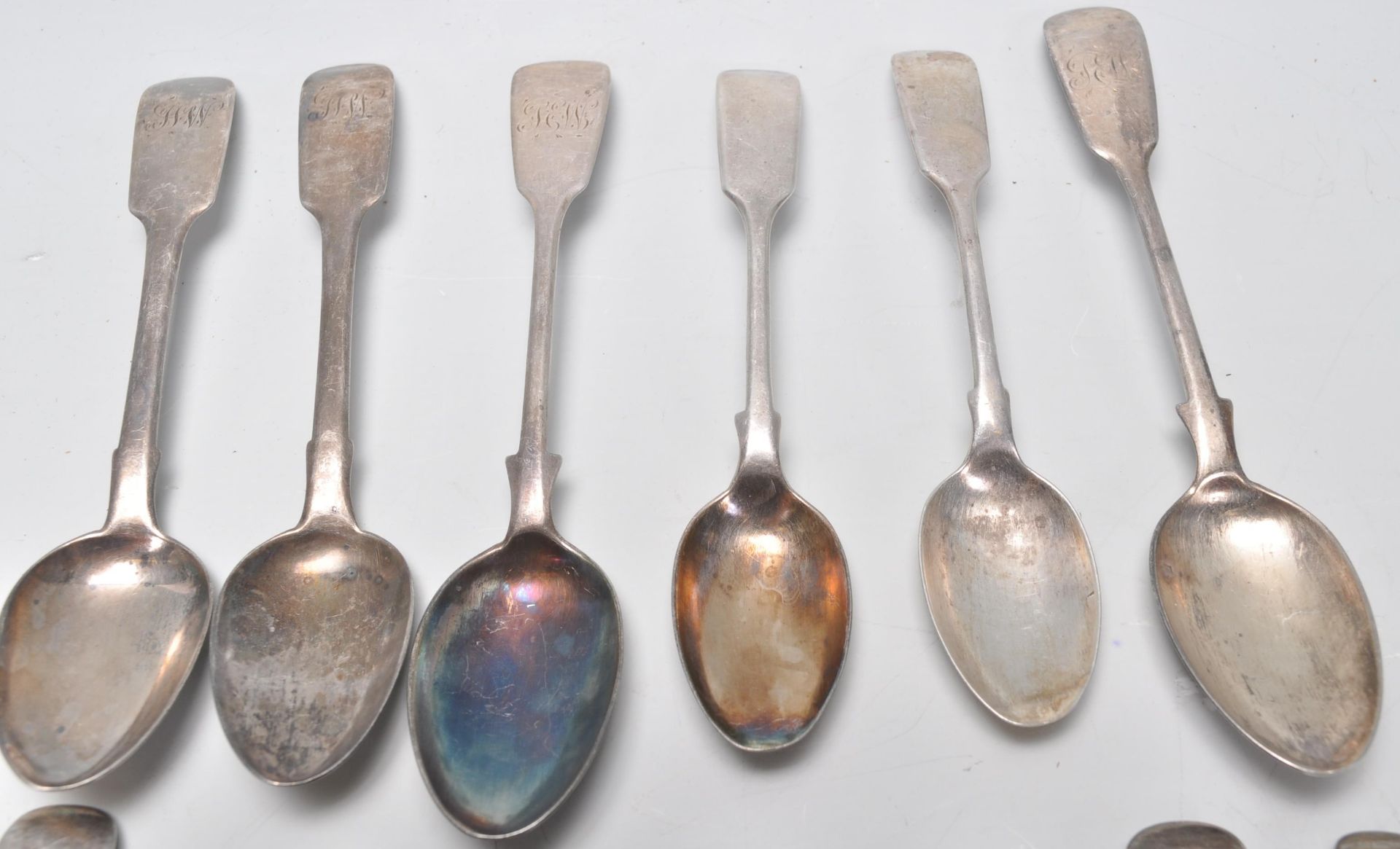 A mixed group of thirteen 19th Century Georgian and Victorian hallmarked silver spoons of similar - Image 2 of 7