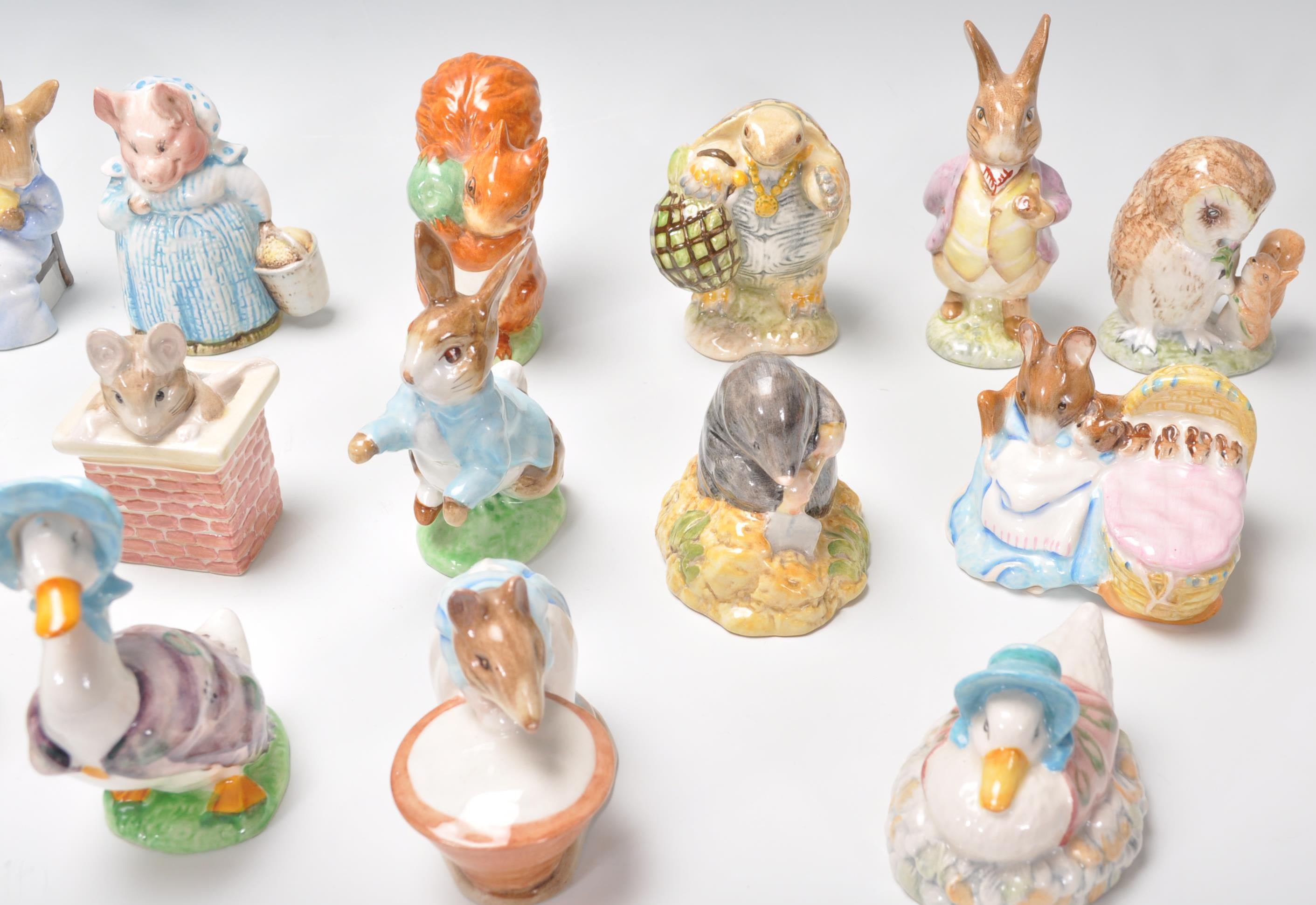 A collection of twenty five Beswick Beatrix Potter figurines to include Mrs Tiggy Winkle, Mr - Image 5 of 7