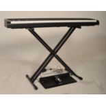 A good Korg B1 Digital keyboard with stand, foot pedal and power pack. Recently pac tested.