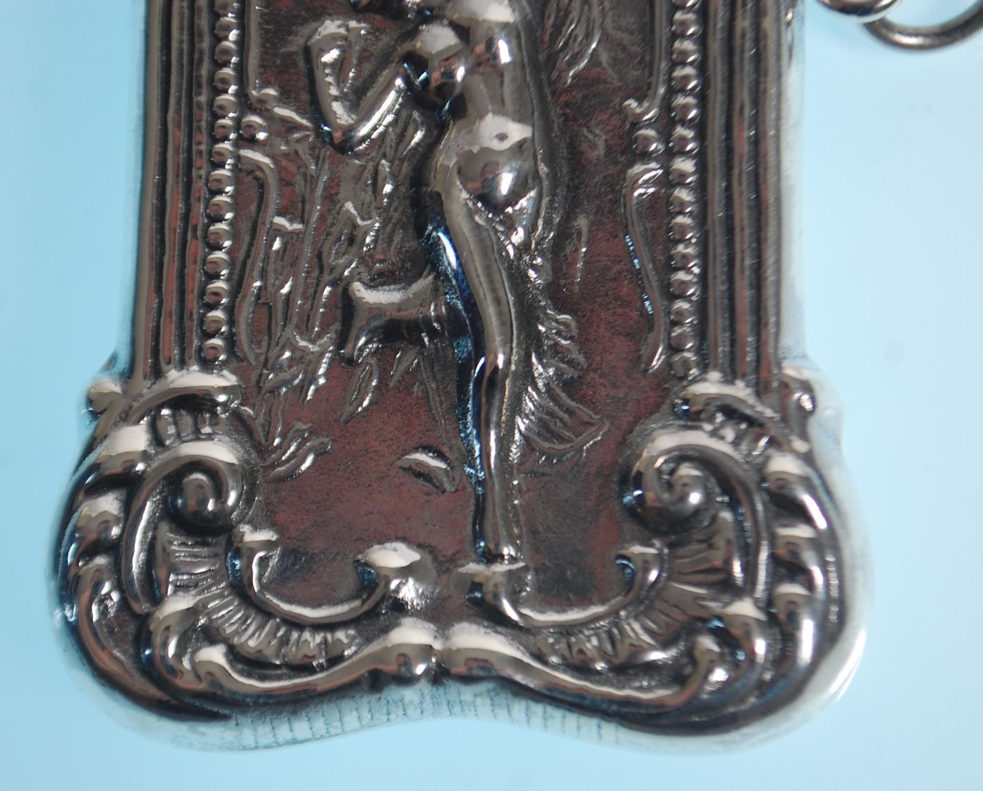 A stamped 925 silver vesta case having a repousse decoration fairy with scrolled borders. Measures - Image 7 of 7