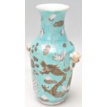 A small early 20th Century Chinese Dayazai vase having a light blue ground decorated with a