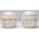 Two 17th 18th Century Chinese Ming dynasty ceramic ginger jars of bulbous form being hand painted