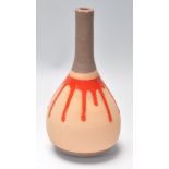 A good vintage retro 20th Century terracotta vase having a waisted neck and globular body with red