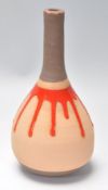 A good vintage retro 20th Century terracotta vase having a waisted neck and globular body with red