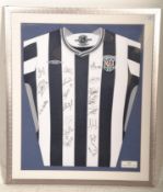 A framed and glazed West Bromwich Albion signed football shirt, The shirt with multiple autographs