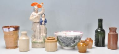 A collection of 19th Century Victorian ceramics to include a Staffordshire flat back depicting a man