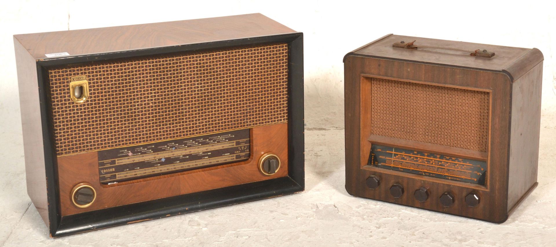 A vintage retro radio to include a Cossor radio being wooden cased with two tuning dials and gilt