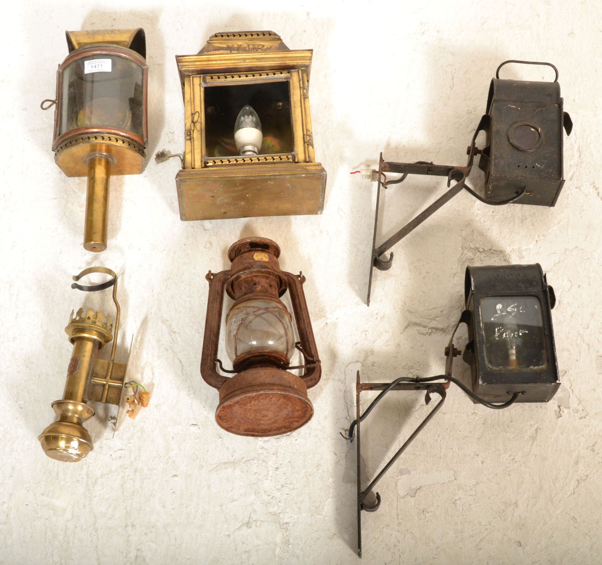 A collection of old vintage 19th and 20th century lamps to include brass cased with WR monogram, - Image 5 of 6