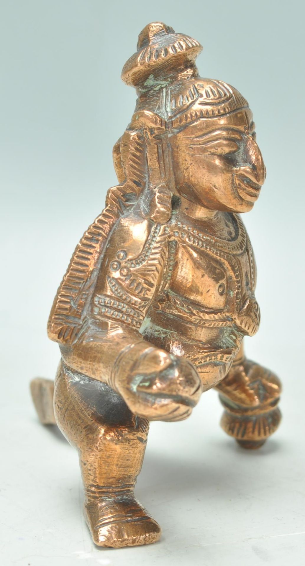 An early 20th Century Indian copper figure of Buddha shown in a standing position having engraved - Bild 2 aus 5