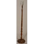 A vintage 20th Century Chinese standard lamp light having a turned stem column with gilt banding and