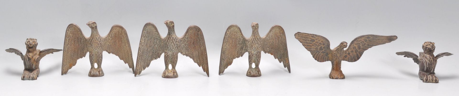 A set of 4 unusual cast brass ceremonial fittings, possibly from  flagstaff poles or staffs. 2