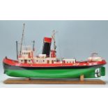 A superb 20th Century museum quality model steamboat of wood and metal construction having a